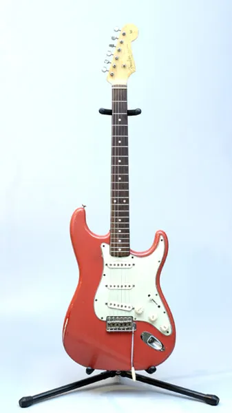 Fiesta Red Stratocaster on a stand
