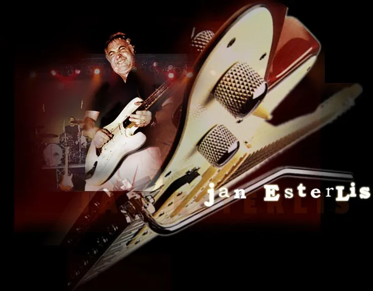 Jan on stage with a white Stratocaster